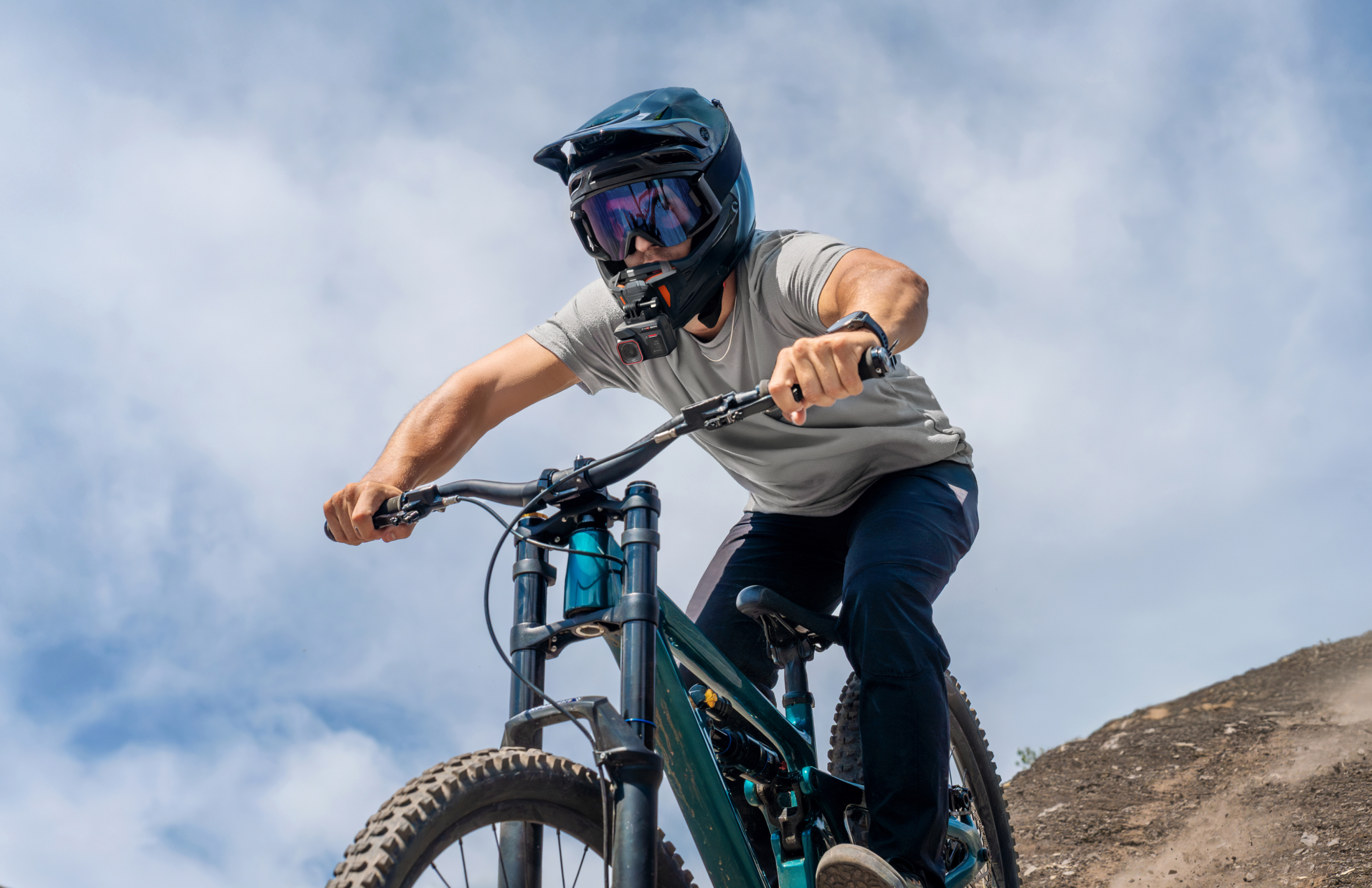 Insta360 Ace Pro 2 mounted onto a mountain biker's helmet.